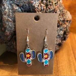 New Southwestern Silver Saguro Catus Earrings.
